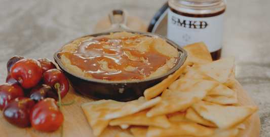 Smoked Brie with SMKD Smoked Cherry Reduction